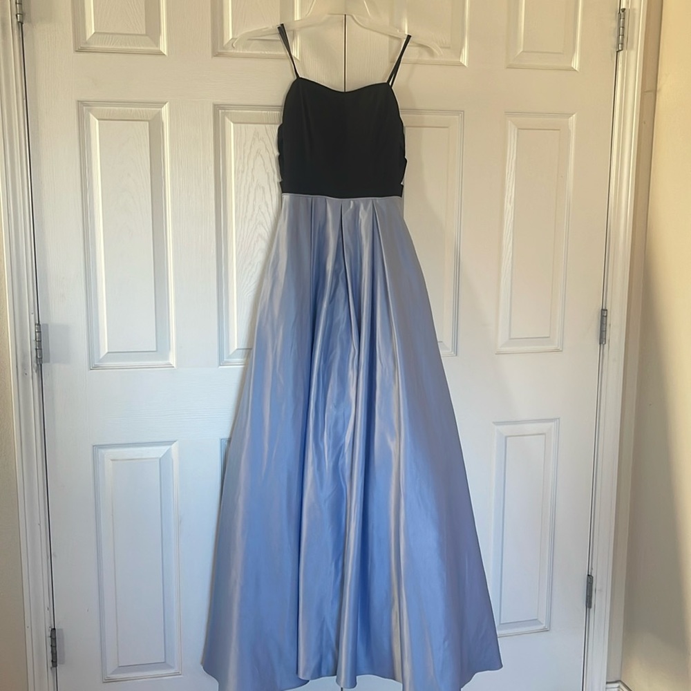 Strapless prom dress. Small pedi coat underneath.  Never worn great condition.
